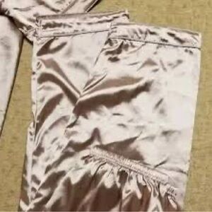 Multiple womens 2 piece Satin sleep wears.